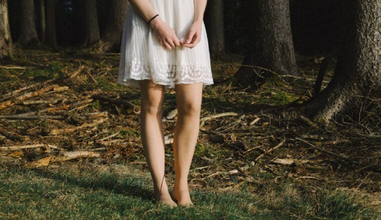 Hoe kan ik inkijk in mijn jurk verminderen?