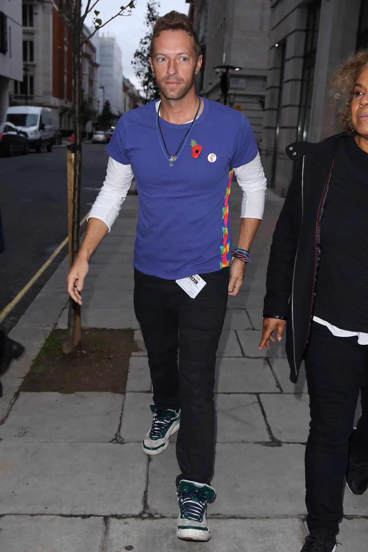 Did Chris Martin wear a black jacket on 'let somebody go'?