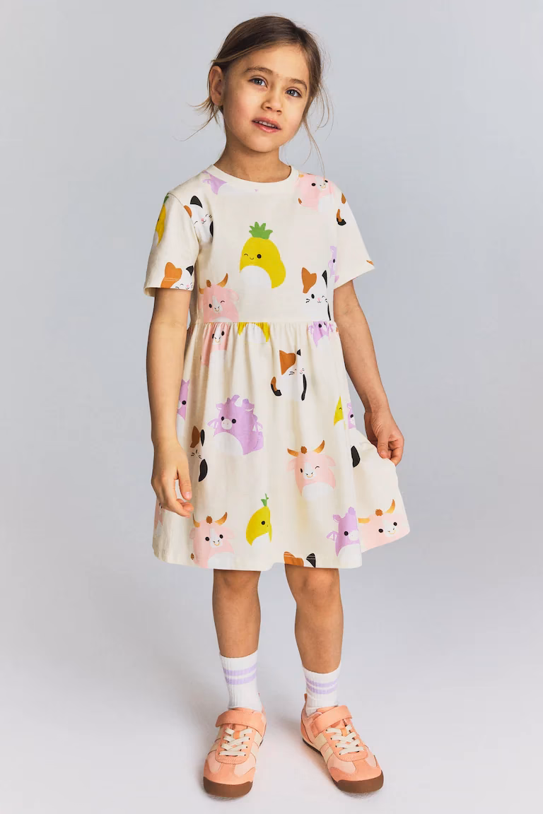 Wat is een tricot jurk?