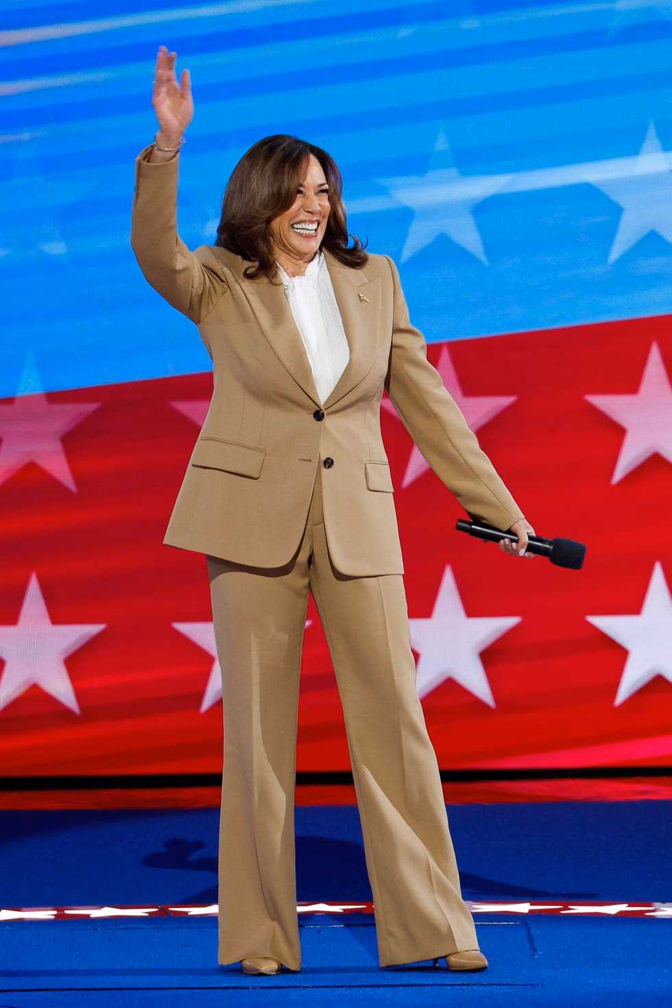 Why does Kamala Harris not wear American designers?