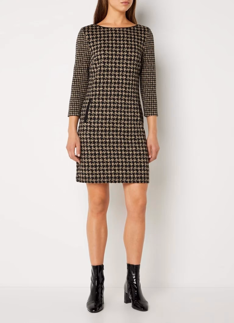 Wat is de betekenis van houndstooth?
