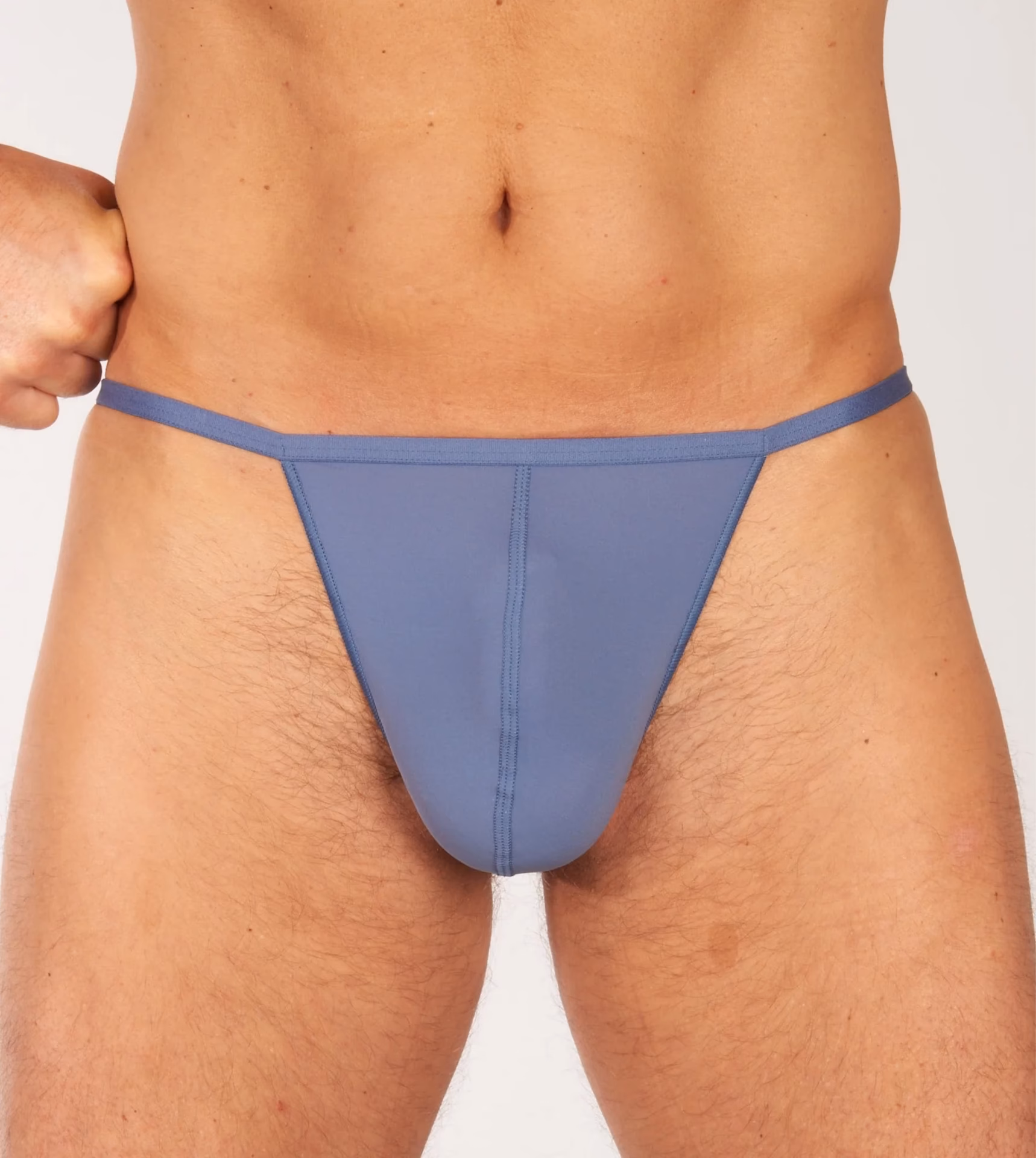 Is het normaal dat een man een string draagt?