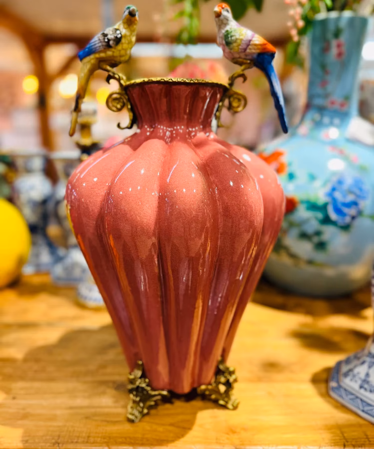 Hoe heet dat merk met een vogeltje?