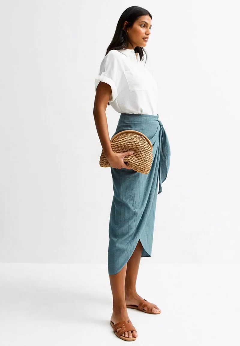 Welke top past bij een wikkelrok?